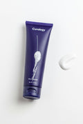 Charcoal cleanser bottle
